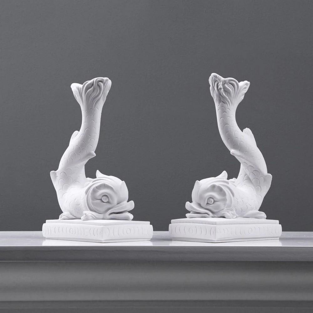 Classic Dolphin Candle Holders – Pair (4lbs): Classic Dolphin Candle Holders – Pair (4lbs) Elegant and full of charm, this pair of Classic Dolphin Candle Holders showcases graceful Italian design with fine sculptural detail. Crafted from white