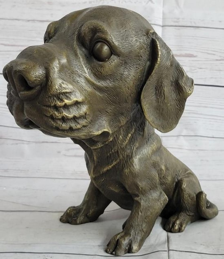 Bobble Head Dog Bronze Statue: Bobble Head Dog Bronze Statue Full of charm and whimsy, this delightful bronze statue features a floppy-eared dog with a bobble head design that adds playful movement to its sweet expression. Crafted