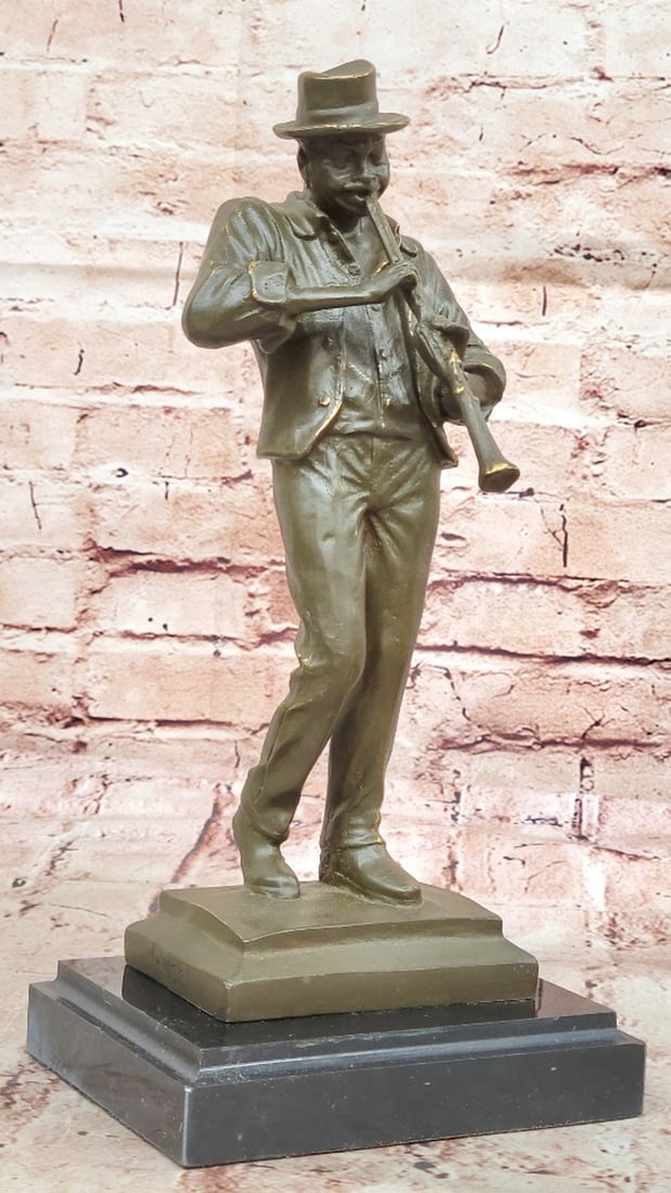 Jazz Performer Original Bronze Statue - 12.5" x 6: Jazz Performer Original Bronze Statue - 12.5" x 6 This handmade bronze sculpture captures the soulful presence of a Black American musician absorbed in the art of playing the clarinet, a tribute