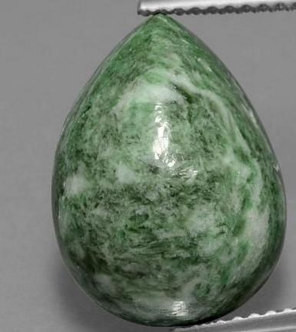 Sage Green Maw-Sit-Sit Pear Cabochon Gemstone: Sage Green Maw-Sit-Sit Pear Cabochon Gemstone Rare and captivating, this pear-shaped Maw-Sit-Sit cabochon displays a serene sage green hue with intricate natural patterns unique to this exotic