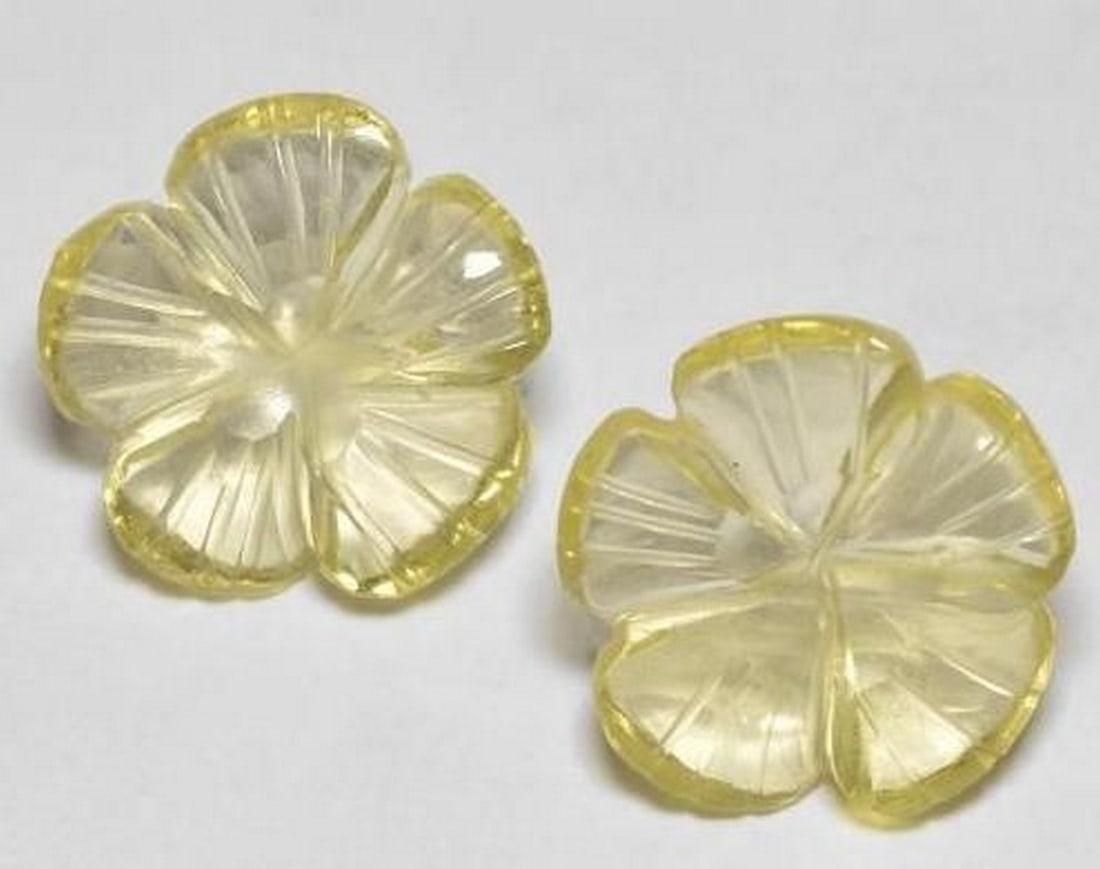 Set of Two Lemon Yellow Quartz Flower Carvings Handcrafted Gemstone Pair: Set of Two Lemon Yellow Quartz Flower Carvings Handcrafted Gemstone Pair Bright and cheerful, this set of two flower-shaped carvings is crafted from radiant lemon yellow Quartz. Each gemstone is