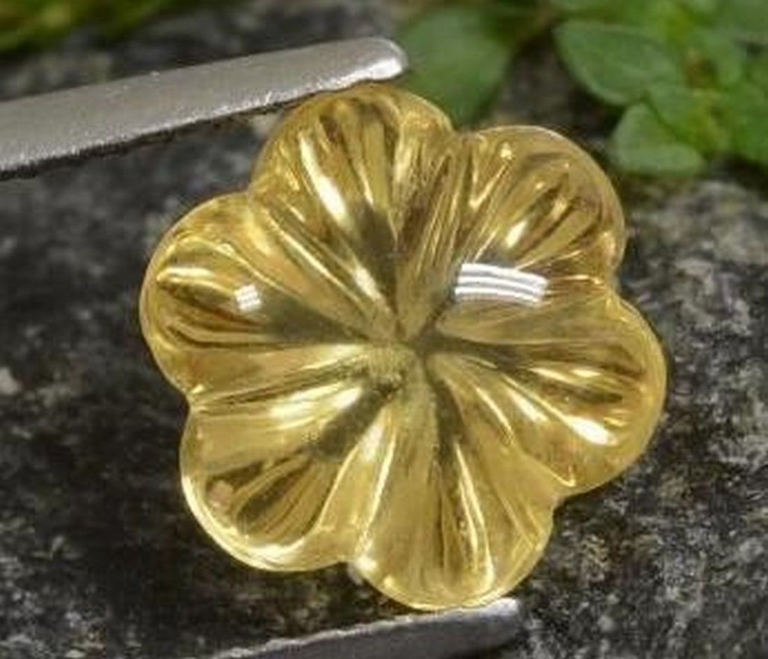 Honey Yellow Citrine Flower Carving: Honey Yellow Citrine Flower Carving Radiating warmth and joy, this exquisite flower-shaped gemstone is carved from genuine Citrine in a rich honey yellow hue. Each petal is delicately sculpted to