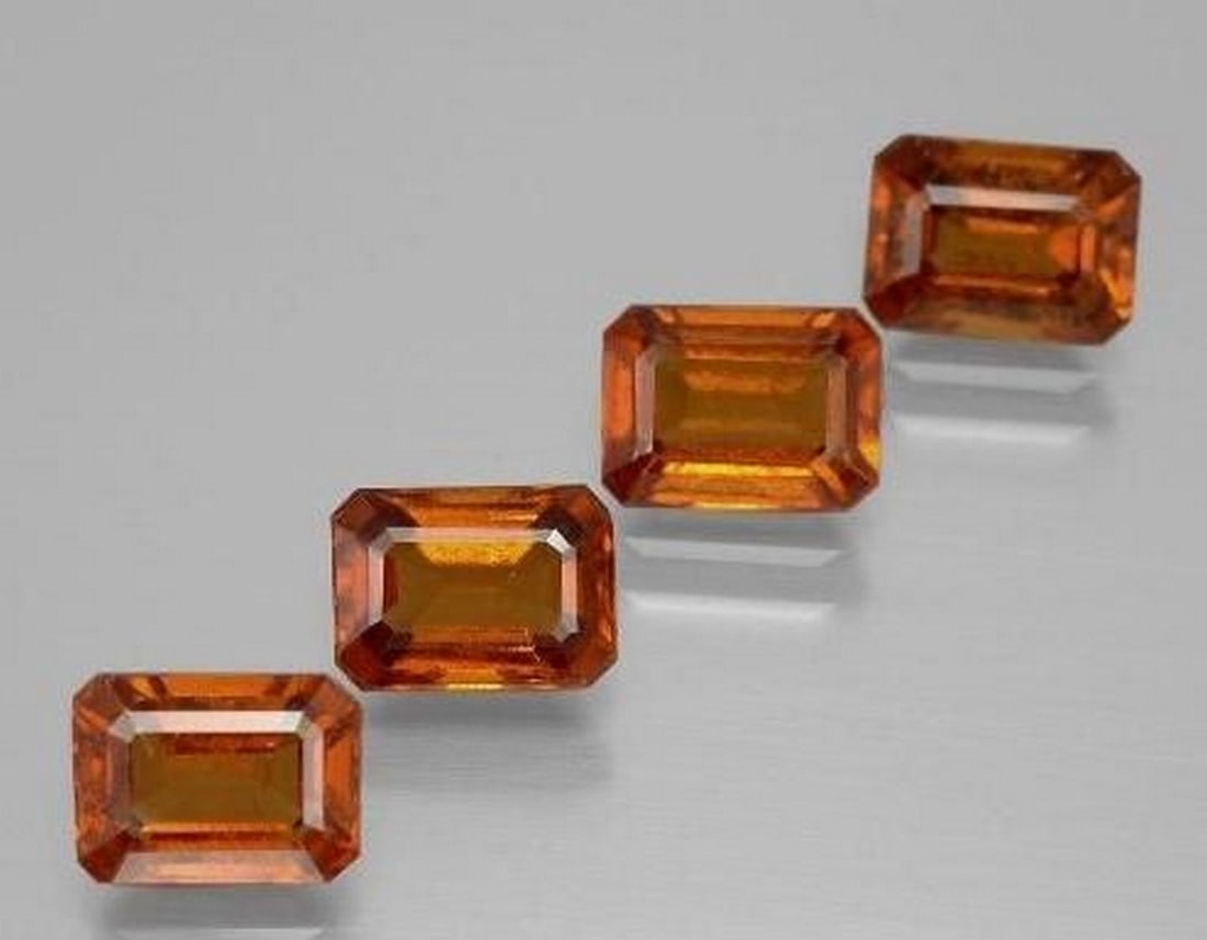 Set of Four Octagon-Cut Medium Orange Hessonite Garnet Loose Gemstones: Set of Four Octagon-Cut Medium Orange Hessonite Garnet Loose Gemstones This stunning set features four loose Hessonite Garnet gemstones, each fashioned in a precise octagon facet cut to highlight