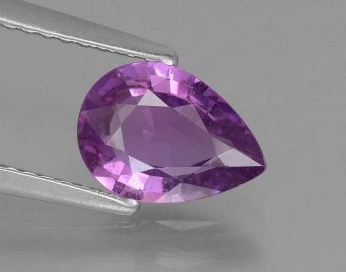 1.42ct Pear Cut Violet Sapphire: 1.42ct Pear Cut Violet Sapphire A stunning medium violet, pear-shaped sapphire with VS clarity, untreated to preserve its natural beauty. Known to inspire creativity, calm the mind, and bring