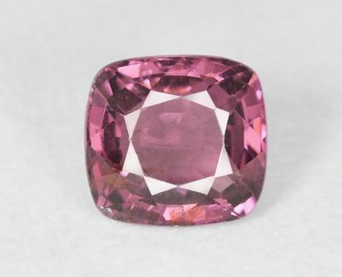 1.15ct Cushion Cut Purple Spinal: 1.15ct Cushion Cut Purple Spinal A medium purple, cushion-cut spinel with VS clarity, untreated to preserve its natural beauty. Believed to inspire vitality, passion, and emotional balance, this Tan