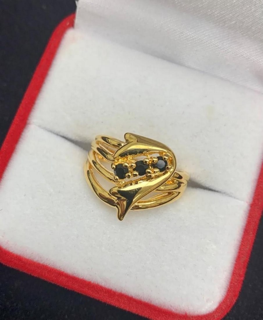 Gold Ring Inset 3 Black Gemstones On A Woven Banded Crown: Gold Ring Inset 3 Polished Black Onyx Gemstones on a Woven Banded Crown. Black Onyx is the anniversary gemstone for the 10th year of marriage. Onyx is a variety of the microcrystalline quartz, called