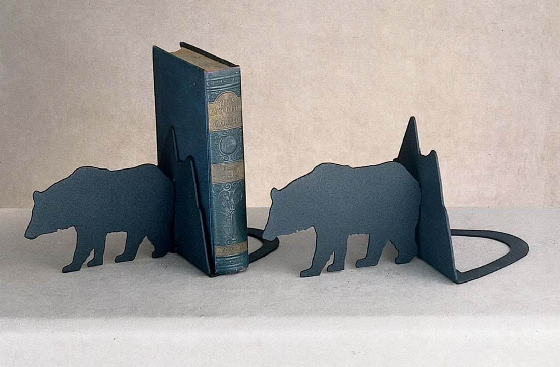 "Lone Bear" Tiffany Collection Bookends: "Lone Bear" Tiffany Collection Bookends Drawing inspiration from the magnificent wildlife and natural splendor of the nearby Adirondack Mountains, these striking bookends showcase a