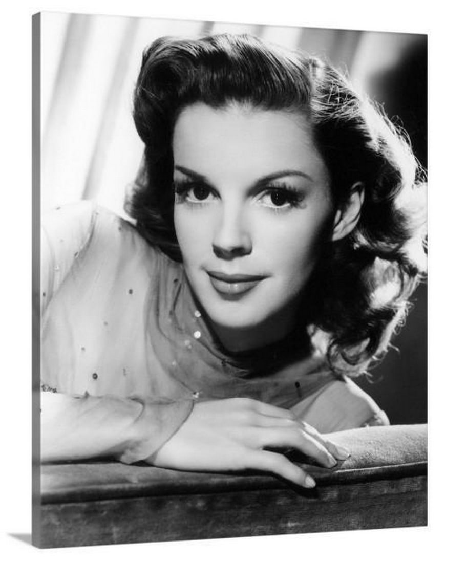 Judy Garland Hollywood Glamour Stretched Canvas Print: Judy Garland Hollywood Glamour Stretched Canvas Print Celebrate the timeless charm of Judy Garland with this elegant stretched canvas print. Capturing the grace and charisma of one of Hollywood’s m