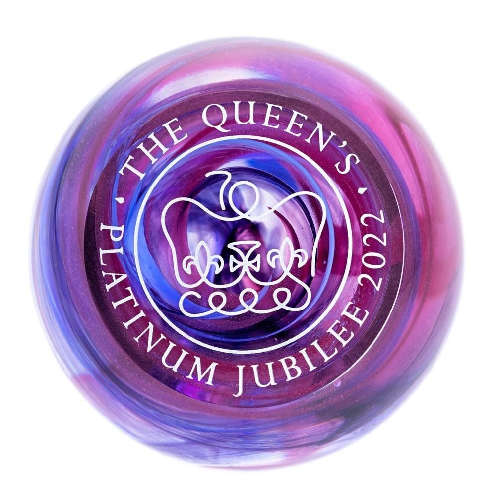 Platinum Jubilee Paperweight: Platinum Jubilee Paperweight A commemorative glass paperweight created to celebrate the historic Platinum Jubilee of Queen Elizabeth II. Marking 70 years on the throne, the longest reign of any