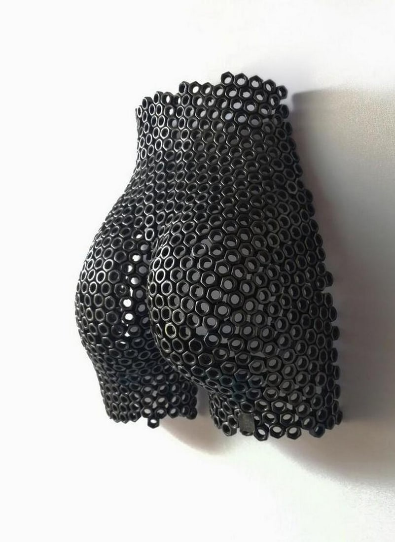 Fluid Grace Metal Torso Sculpture: Fluid Grace Metal Torso Sculpture This striking life-size abstract sculpture captures the essence of the female form through elegant, flowing lines. Meticulously hand-formed and welded from metal, it