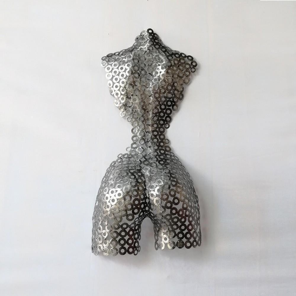 Celestial Poise Metal Torso Sculpture: Celestial Poise Metal Torso Sculpture This stunning abstract metal torso sculpture captures the elegance of the female form with flowing, artistic lines. Handcrafted through meticulous welding and sh