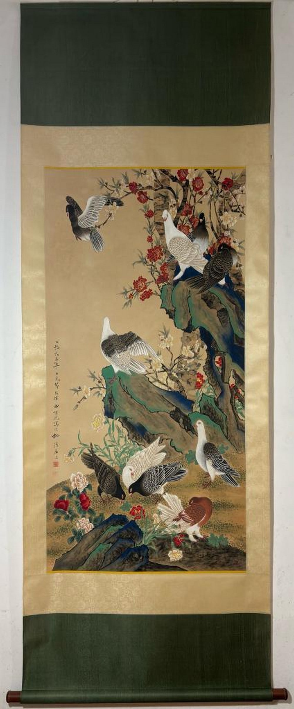 Inspired Hand Painted Scroll Garden of Tranquility: Inspired Hand Painted Scroll Garden of Tranquility In this graceful scroll painting inspired by Tian Shiguang, a flock of doves gathers in peaceful harmony beneath a blooming flower tree. Some soar g
