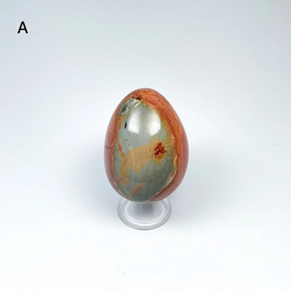 Polychrome Jasper Mini Egg: Polychrome Jasper Mini Egg Polychrome jasper, also called desert jasper, is a multi-colored stone discovered in Madagascar. It is believed to bring happy energy, good fortune, and a positive outlook,