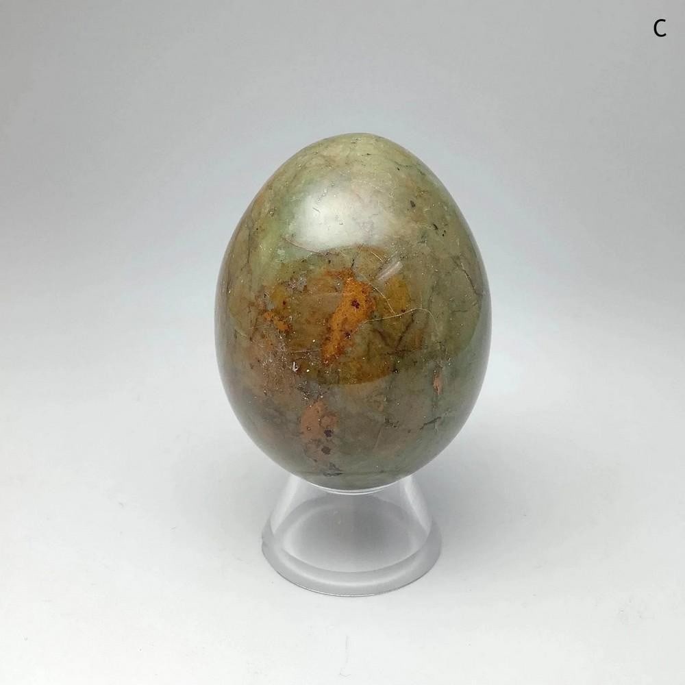 Chrysoprase Mini Egg: Chrysoprase Mini Egg Chrysoprase is a green gemstone that ranges from milky or yellow-green to translucent shades with natural inclusions or veining, adding to its unique beauty. Carved into a small