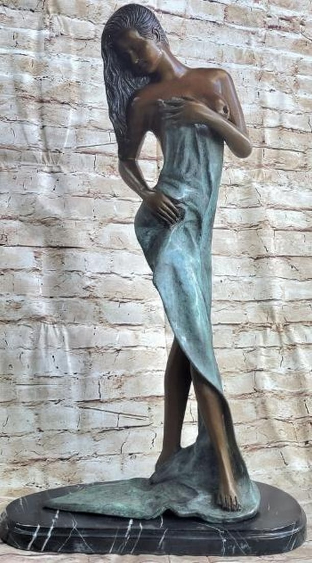 Serene Reflection Bronze Sculpture - 26" x 14": Serene Reflection Bronze Sculpture - 26" x 14". A graceful original bronze sculpture inspired by and bearing the signature of artist Collett, of a woman gently draped in a flowing blue towel/s
