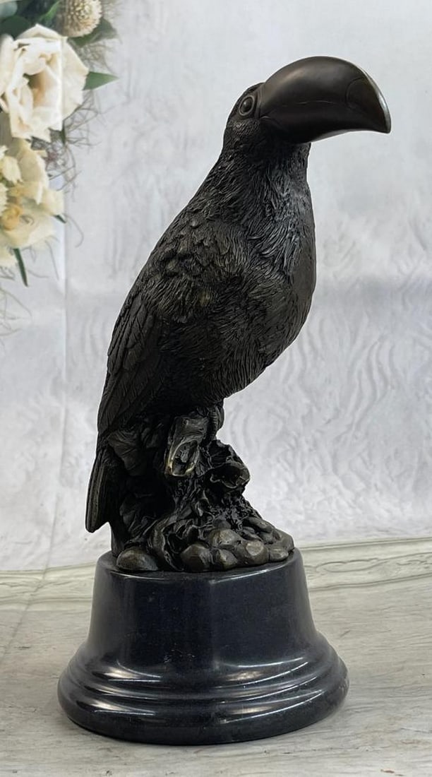 Tropical Toucan Bird Bronze Sculpture On Marble Base - 10" x 5": Tropical Toucan Bird Bronze Sculpture On Marble Base - 10" x 5" Introducing an enchanting bronze sculpture that captures the essence of a stoic bird perched high, gazing upon the world