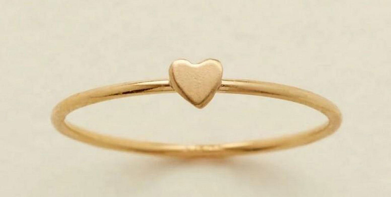 Heartfelt Stacking Ring - Size 9: Heartfelt Stacking Ring - Size 9 The best gifts are wrapped in love, and this delicate stacking ring is a perfect example. Featuring a tiny heart, this petite band is ideal for stacking to add a