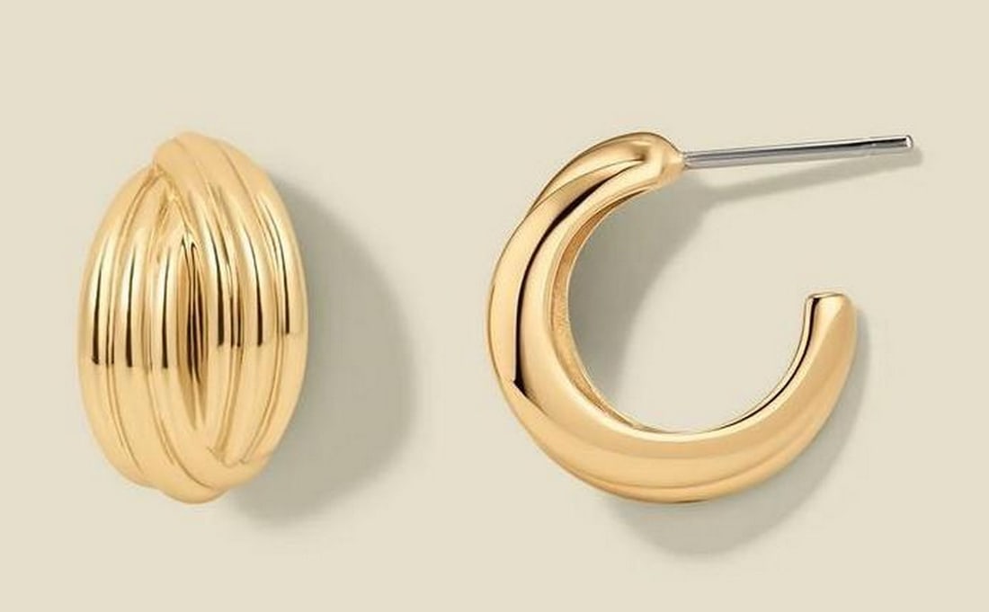 14k Gold Plated Twisted Hoop Earrings: 14k Gold Plated Twisted Hoop Earrings These hoops feature overlapping curves and a subtle polished shine, offering a modern twist on a classic silhouette. Crafted in 14k gold plated brass, they balanc