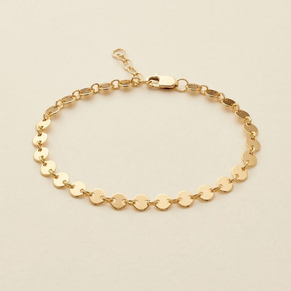 Gold Poppy Bracelet: Gold Poppy Bracelet A delicate balance of shimmer and simplicity, the Poppy Chain Bracelet is perfect for stacking or making a subtle statement on its own. Its timeless design adds a touch of elegance
