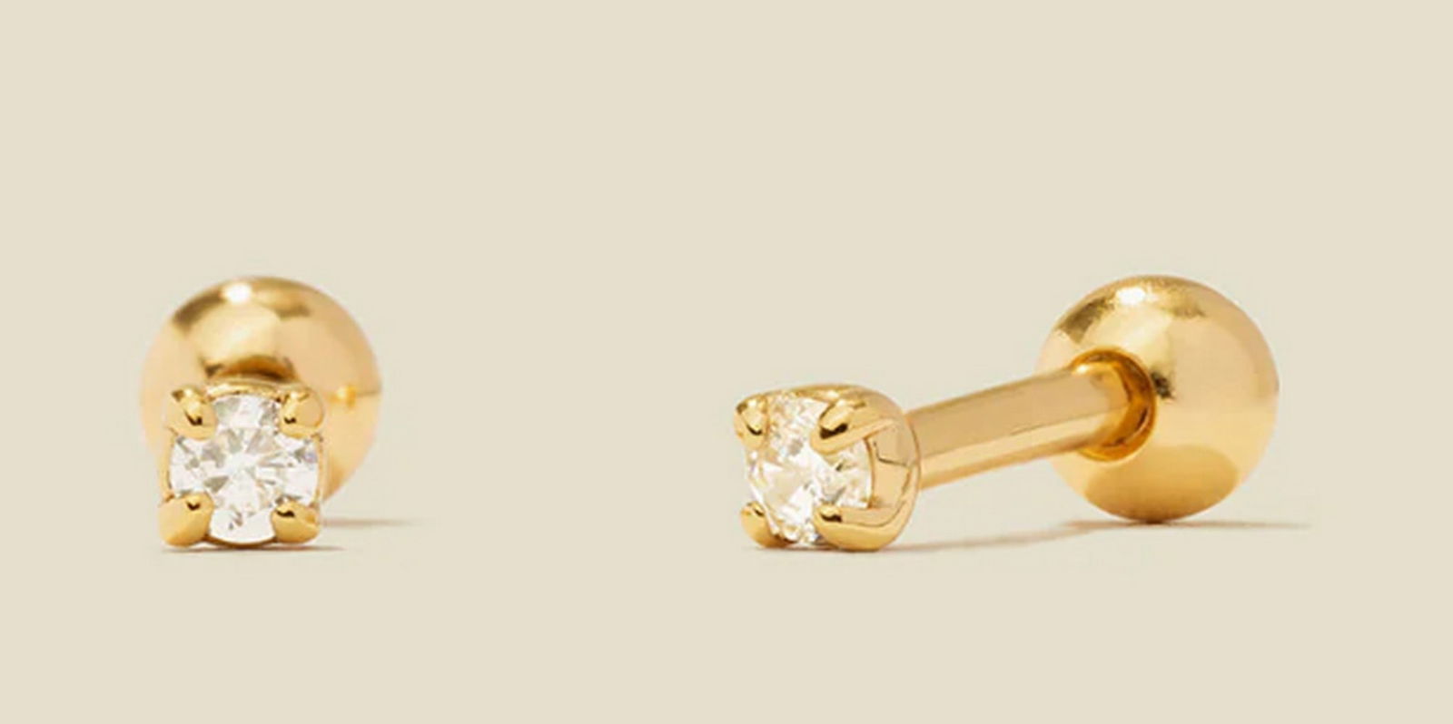 Vermiel Gold CZ Petite Prong-Set Stud Earrings: Vermiel Gold CZ Petite Prong-Set Stud Earrings No illusion here—these mini prong-set CZ studs offer the perfect blend of casual elegance and confidence. With a shorter post length and screw-on bal