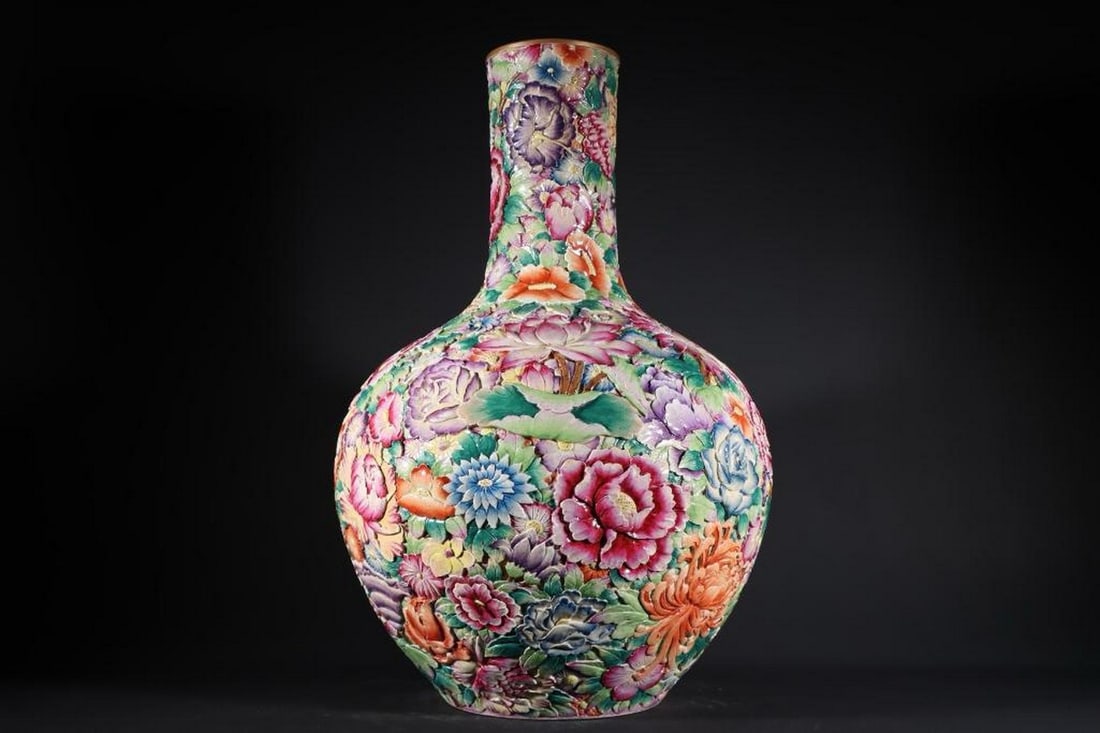 Hand-Carved High Relief Peony Flower Pattern Ball Bottle: Hand-Carved High Relief Peony Flower Pattern Ball Bottle An exquisite porcelain ball bottle inspired by the Qing Qianlong. It is intricately hand-carved in full high relief with a stunning peony flow