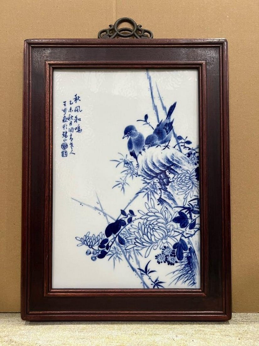Hand-Painted Blue and White Birds and Flowers Plaque: Hand-Painted Blue and White Birds and Flowers Plaque. A beautifully hand-painted blue and white porcelain plaque, with the mark of Wang Bu. The scene features graceful birds amidst vibrant flowers, wi