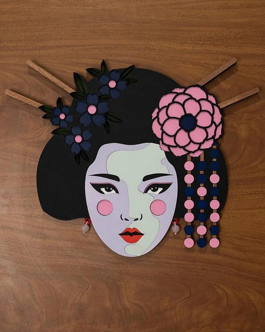 Handcrafted Japanese Geisha Wooden Wall Mask: Handcrafted Japanese Geisha Wooden Wall Mask Elevate your space with the timeless elegance of this handcrafted Japanese Geisha wooden wall mask. Intricately designed with refined details and a strikin