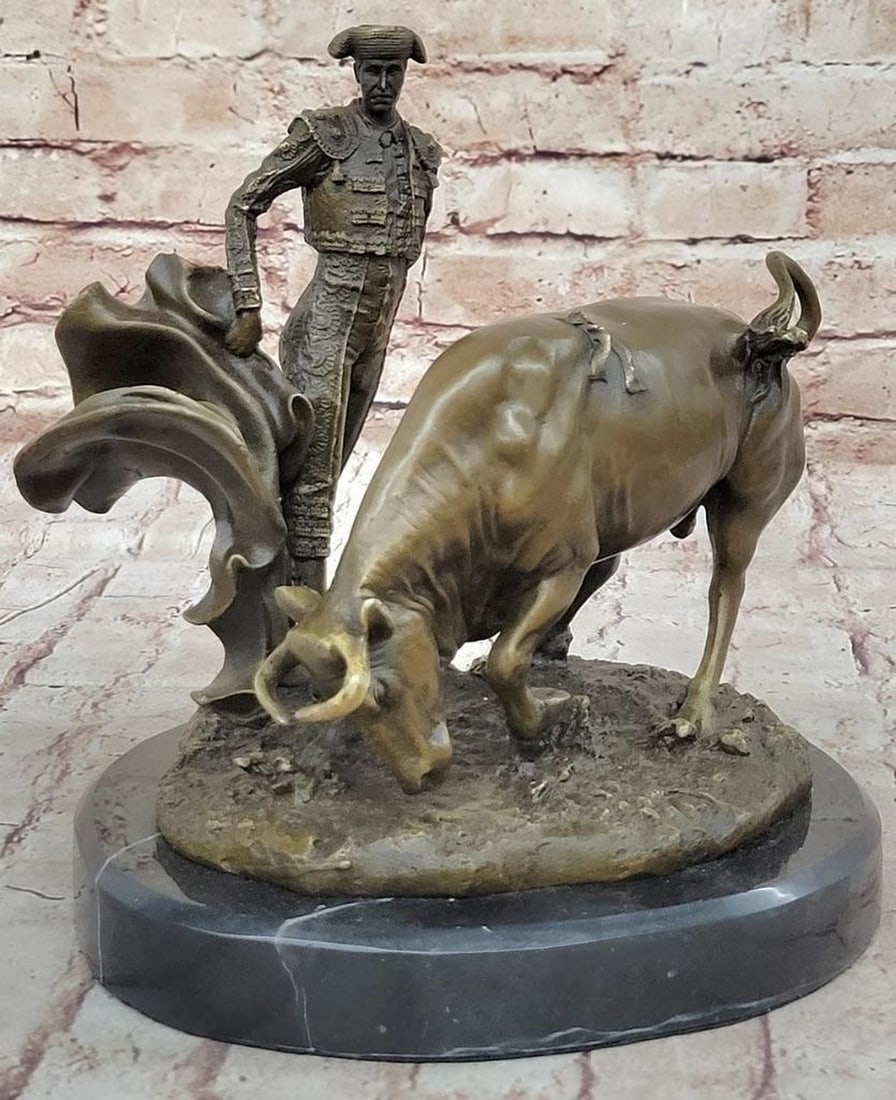 Dynamic "Matador with Bull" Bronze Sculpture by Fisher: Dynamic "Matador with Bull" Bronze Sculpture by Fisher The "Matador with Bull" bronze sculpture by Fisher vividly captures the intense drama of a classic Spanish bullfight. This dynami