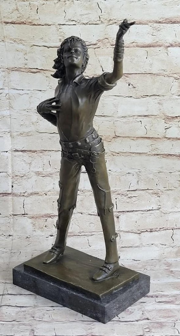 Handmade Young Michael Jackson Bronze Sculpture: Handmade Young Michael Jackson Bronze Sculpture Billy Jean. Bad. Or just a Smooth Criminal. No matter what you called him, he was still the greatest. Michael Jackson's legacy spanned decades and