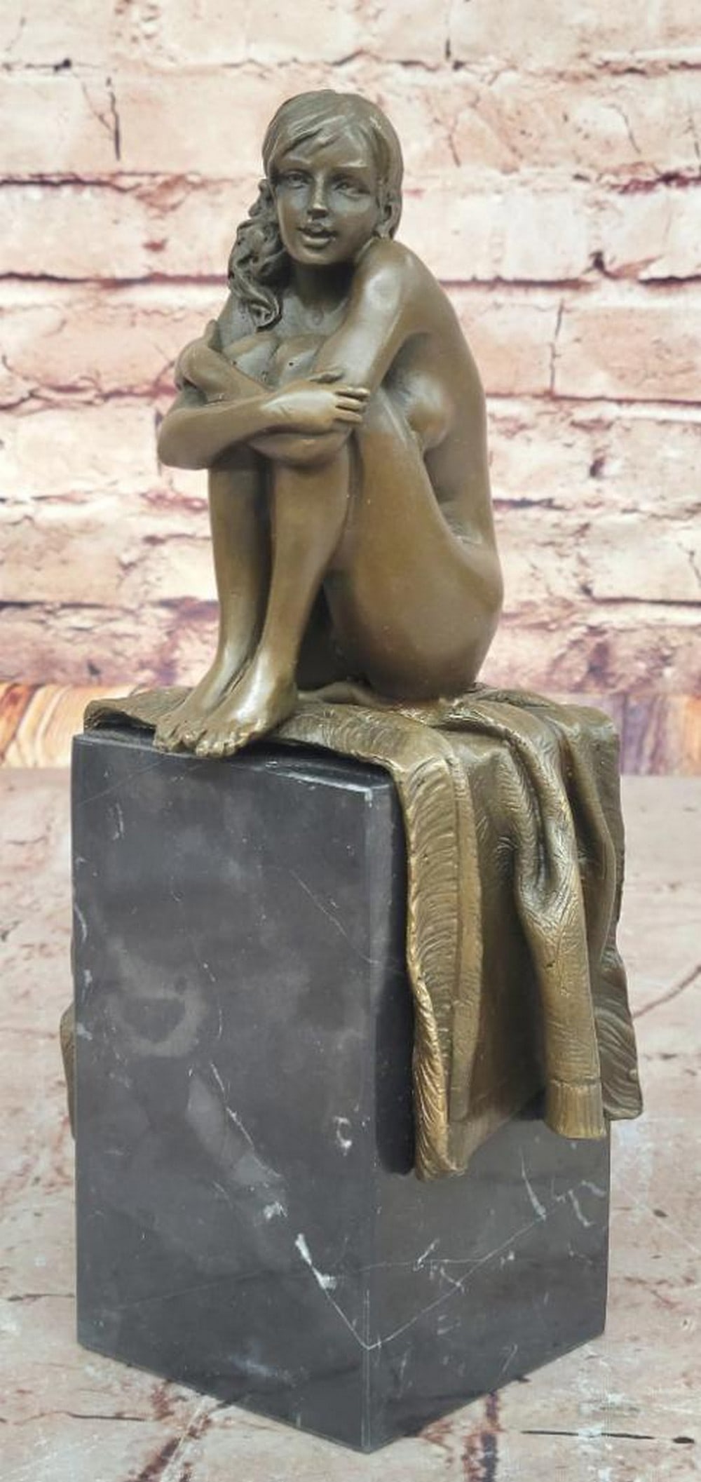 Contemplative Beauty Bronze Sculpture by Mavchi - 10" x 3": Contemplative Beauty Bronze Sculpture by Mavchi - 10" x 3" This exquisite bronze sculpture captures a young woman in quiet introspection, her downcast gaze and serene posture embodying both el