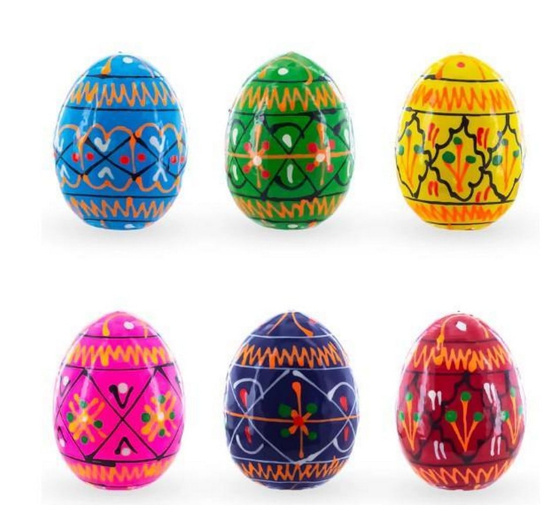 Miniature Masterpieces of Ukraine: Miniature Masterpieces of Ukraine A beautifully hand-painted set of six mini Ukrainian Easter eggs, each adorned with intricate traditional patterns symbolizing prosperity, protection, and