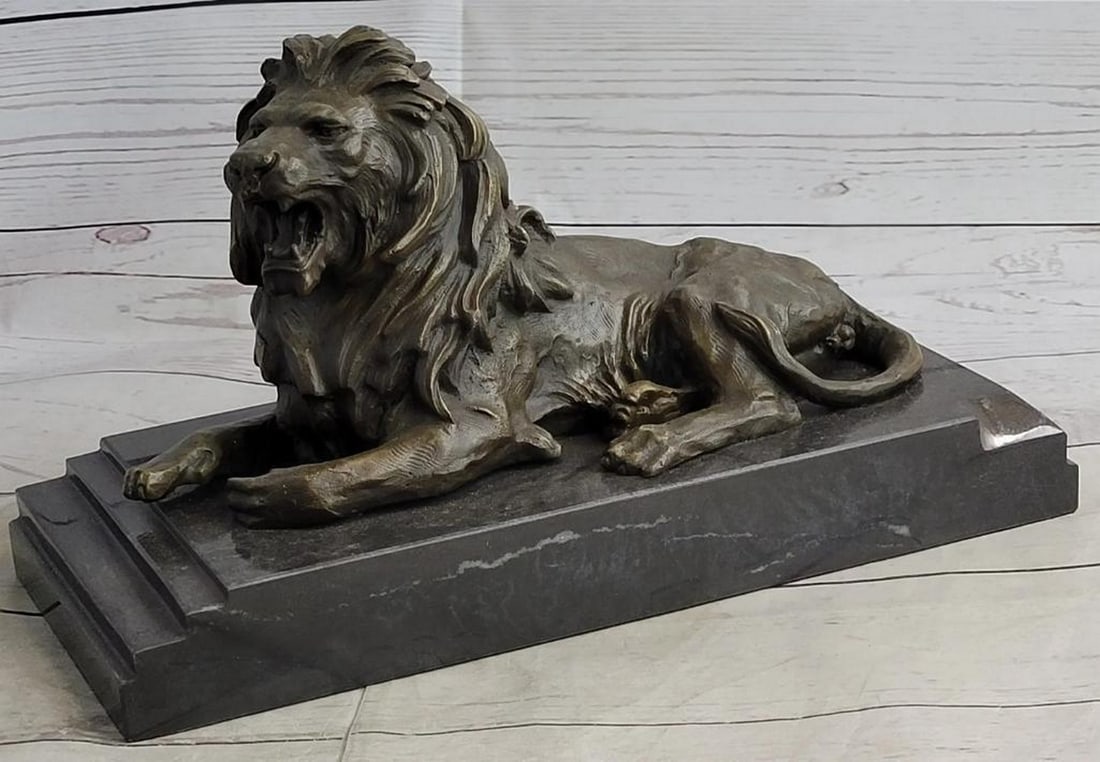 Majestic Lion Bronze Sculpture Inspired by Barye - 7" x 12": Majestic Lion Bronze Sculpture Inspired by Barye - 7" x 12" Exuding raw power and untamed ferocity, this mesmerizing bronze sculpture by Barye immortalizes a lion in a captivating display of