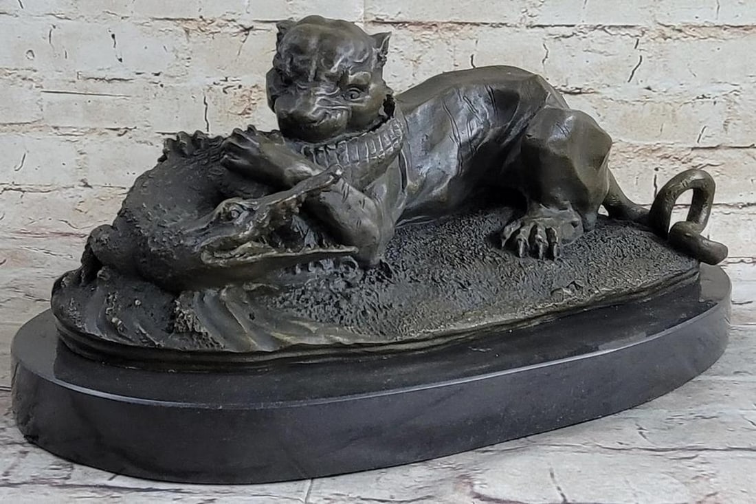 Panther Versus Alligator Bronze Sculpture On Marble Base - 8" x 15": Panther Versus Alligator Bronze Sculpture On Marble Base - 8" x 15" This amazing piece of a black panther biting an small alligator symbolizes the animal wild life. The ways of them to surviv