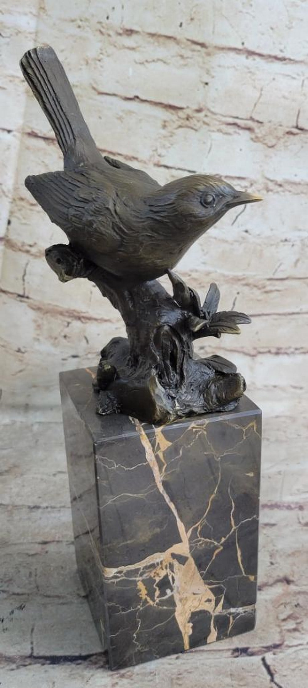 Canary Perched on Twig Original Bronze Statue - 11" x 5": Canary Perched on Twig Original Bronze Statue - 11" x 5" This bronze statue features a canary perched on a twig, captured mid-song with its beak open. The detailed craftsmanship