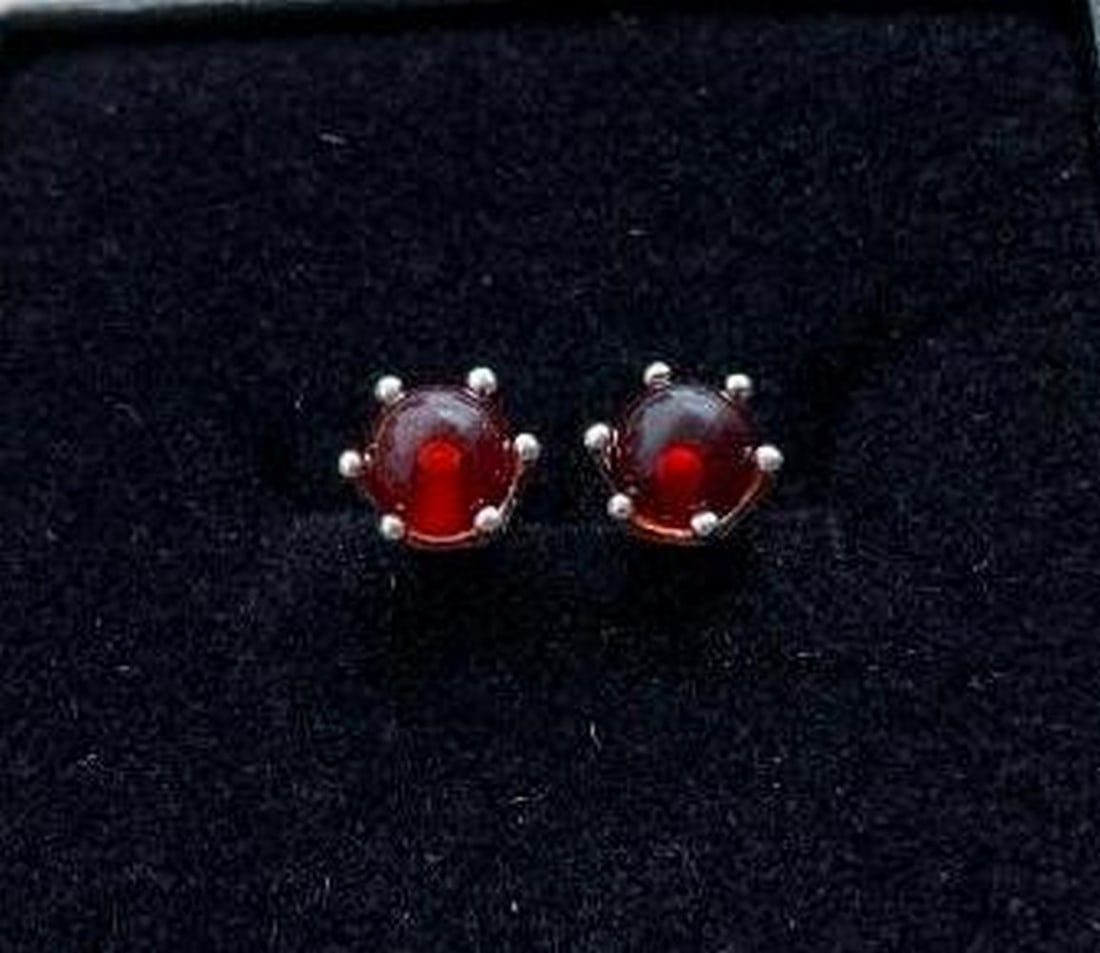 Silver-Tone Stud Earrings with Amber-Colored Stone Sphere: Silver-Tone Stud Earrings with Amber-Colored Stone Sphere Add a touch of warmth and elegance to your look with these minimalist silver-tone stud earrings. Each earring features a smooth,