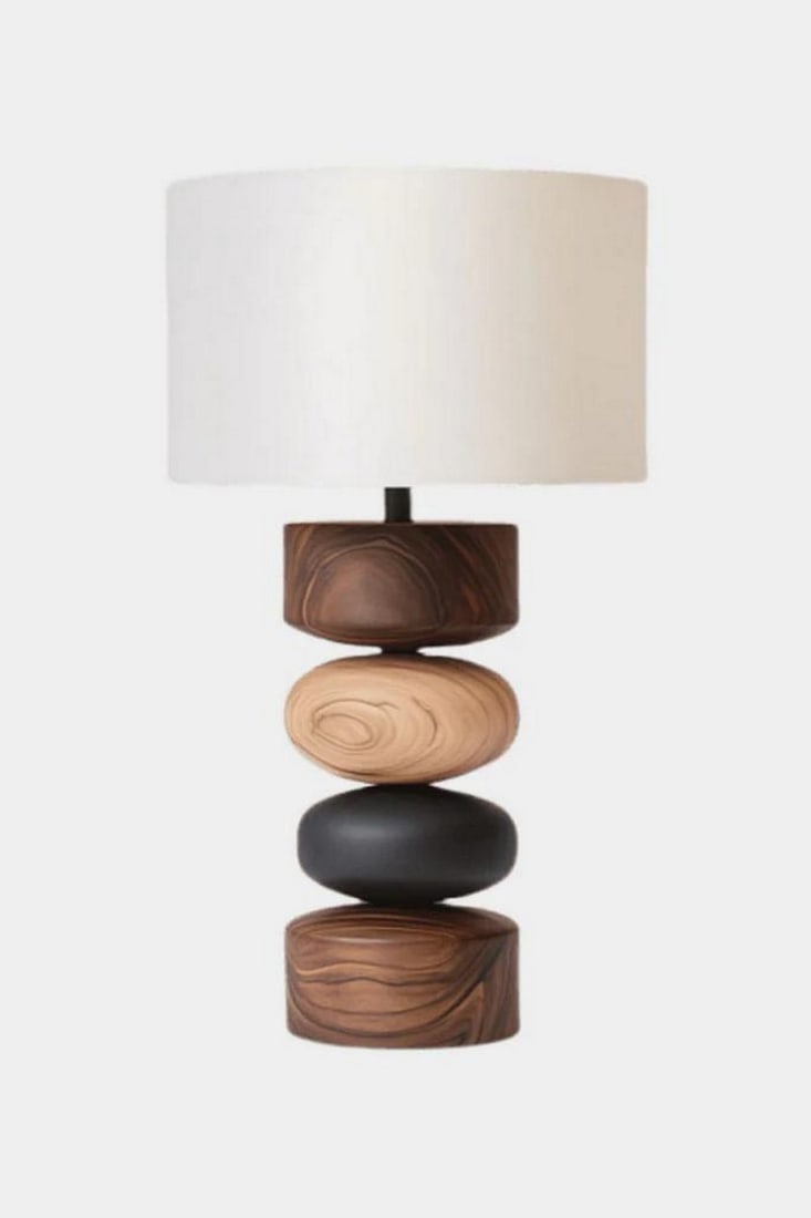Contemporary Multi-Tone Wood Table Lamp: Contemporary Multi-Tone Wood Table Lamp This table lamp features a vertically stacked base composed of rounded wood forms in contrasting finishes, including dark wood, light natural wood, and a matte
