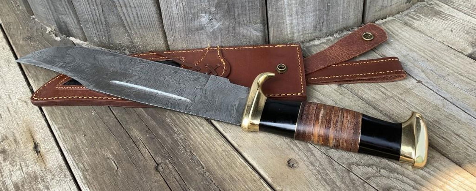 Titan’s Edge: The Majestic Damascus Hunter’s Blade with Wood Grip & Leather Sheath: Titan’s Edge: The Majestic Damascus Hunter’s Blade with Wood Grip & Leather Sheath. Unleash the power and precision of this piece, a masterfully crafted hunting knife that combines strength,
