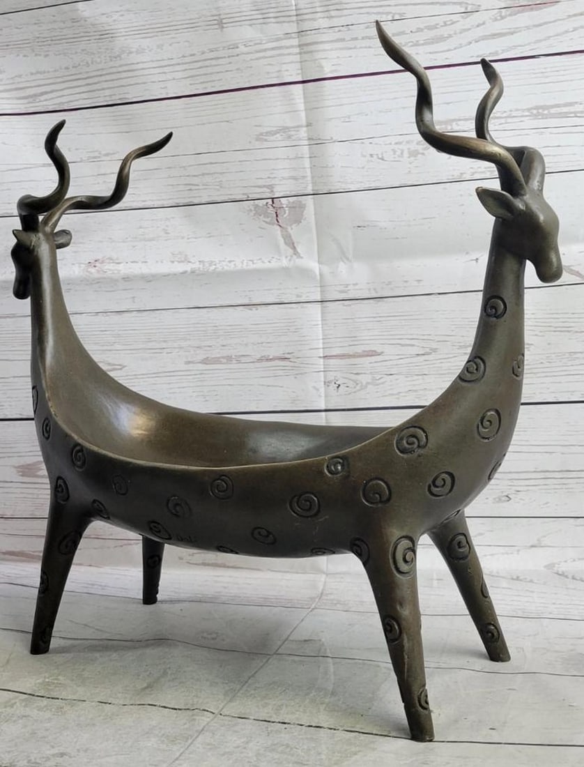 Two Gazelles Bronze Planter Dish - 15.5" x 17.5": Two Gazelles Bronze Planter Dish - 15.5" x 17.5" Add some flair to your home or garden with this beautiful Gazelle Head Sculpture dish or planter. Beautifully crafted to show off these majest