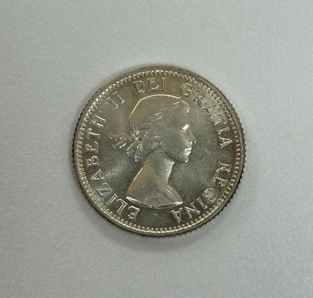 ???????1953 Canadian 10 Cent Coin: 1953 Canadian 10 Cent Coin Legend (lettering): Obverse: ELIZABETH II DEI GRATIA REGINA Reverse: CANADA 1953 10 CENTS Design(s): Obverse: Bust of Queen Elizabeth II wearing a laurel