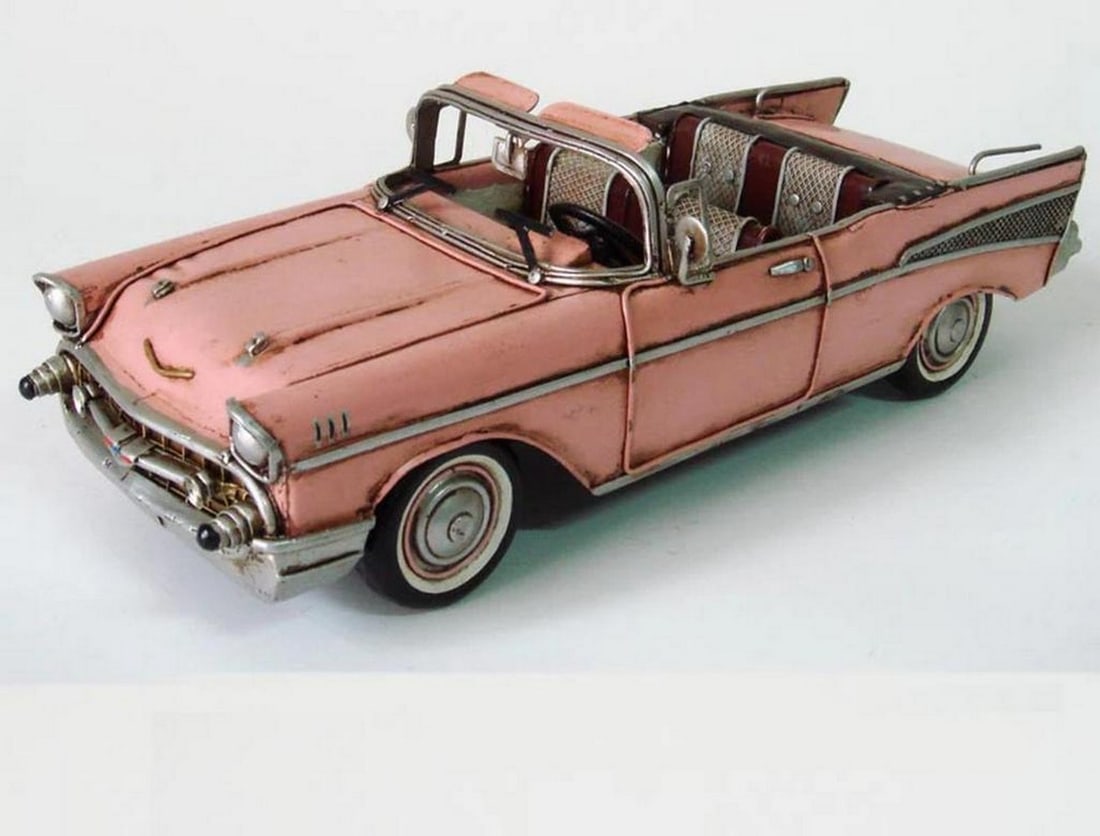 Vintage Pink 1957 Chevrolet Bel Air Nomad Die-Cast Collectible Model Car: Vintage Pink 1957 Chevrolet Bel Air Nomad Die-Cast Collectible Model Car Expertly handcrafted, each piece is a unique collectible and a striking home display. Measuring approximately 4 x 12 inches (H