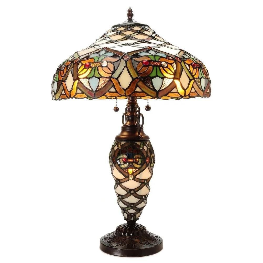 Tiffany-Inspired Double Light Ivory Table Lamp: Tiffany-Inspired Double Light Ivory Table Lamp Ivory glass table lamp with illumination in both the base and the upper shade. The fixture features an antique brown finish and is operated by pull-chai