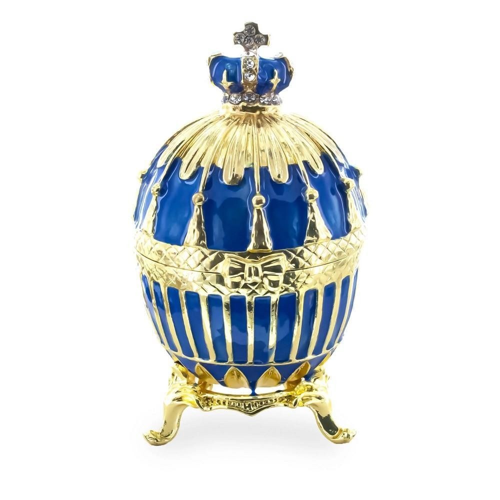 1885 Inspired Blue Enamel Ribbed Royal Imperial Easter Egg: 1885 Inspired Blue Enamel Ribbed Royal Imperial Easter Egg This elegant royal blue Easter egg features gold-plated pewter, Austrian crystals, and hand-painted enamel with golden trim. It opens on a hi