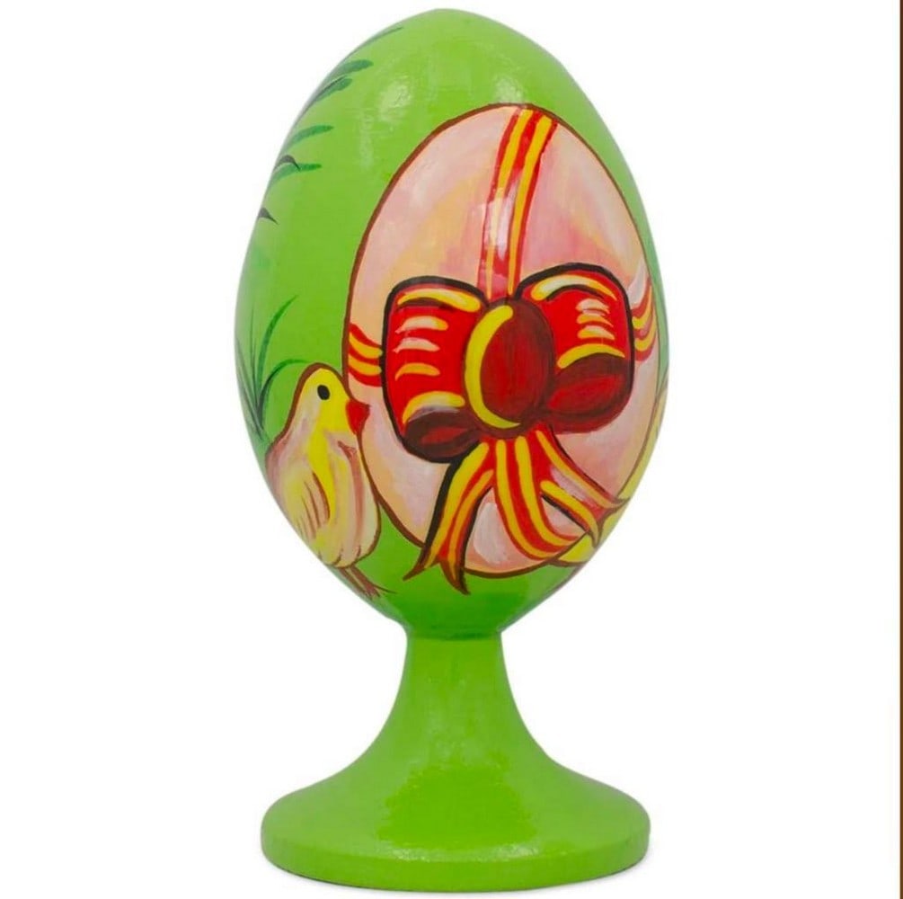 Cute Chiclets With Easter Egg Wooden Figurine: Cute Chiclets With Easter Egg Wooden Figurine. This figurine displays two chiclets on both sides of a nicely wrapped Easter egg. This egg is 3.5 inches tall, hand painted, and has an attached