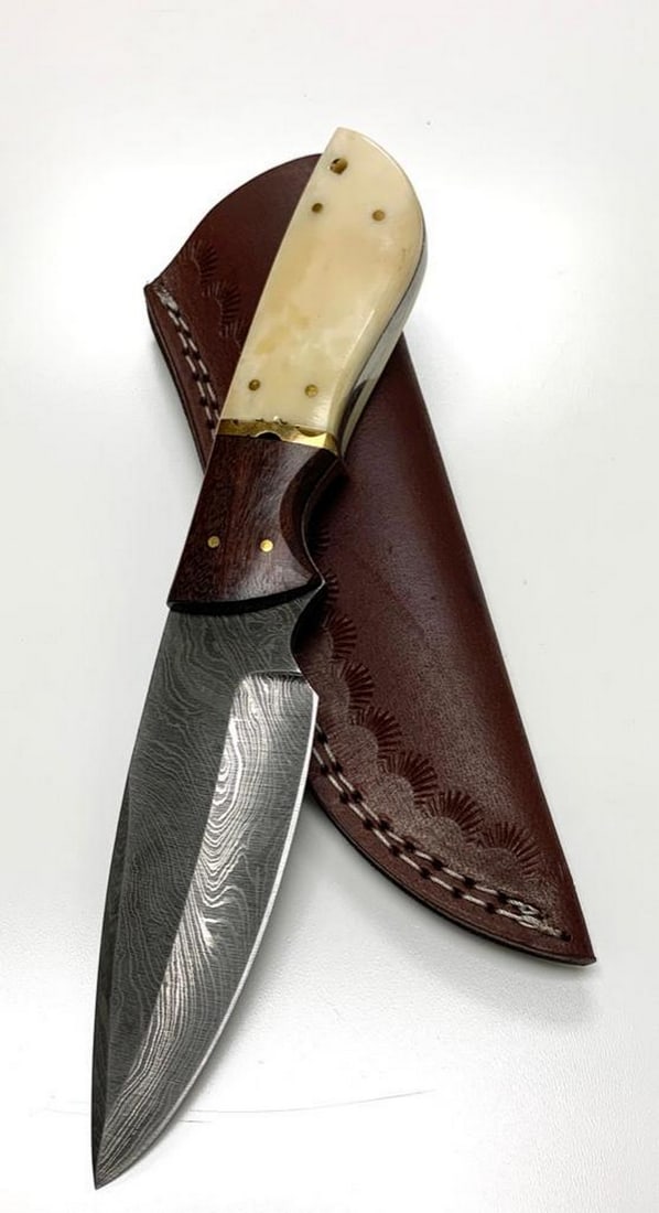 Straight Back Full Tang Damascus Blade: Straight Back Full Tang Damascus Blade Damascus Steel Blade with 256 Layers on it. HARDNESS 56-60 H R C VERY HIGH QUALITY GENUINE LEATHER SHEATH SIZE: Overall Length: 9" Blade Length:
