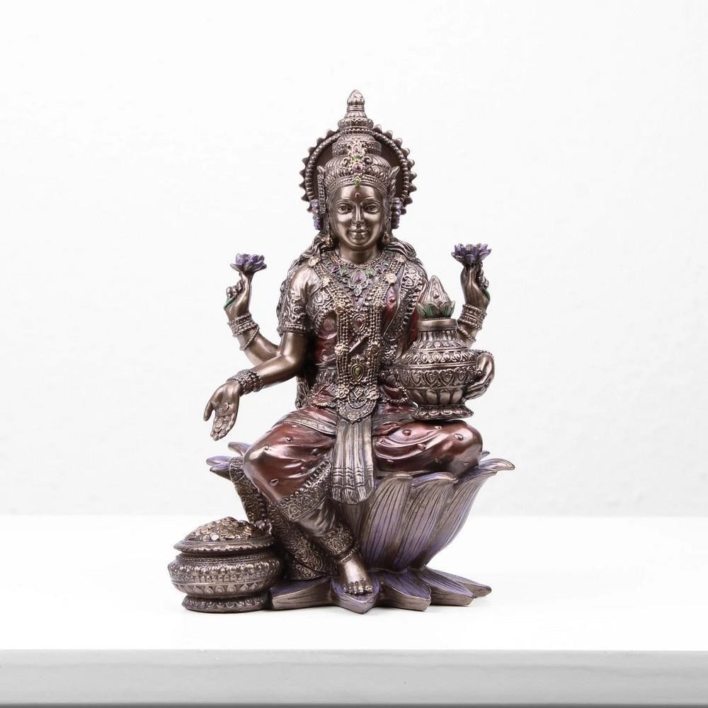 Inspired Lakshmi Indian Goddess Cold Cast Bronze Sculpture - (1.5lbs): Inspired Lakshmi Indian Goddess Cold Cast Bronze Sculpture - (1.5lbs) The Lakshmi Indian Goddess Statue, made from cold cast bronze, symbolizes grace, beauty, and abundance in Hindu mythology.