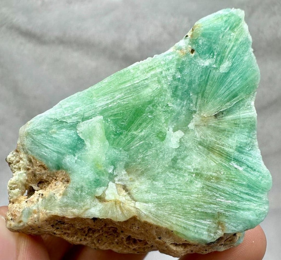 Flower Shape Aragonite Crystal Specimen: Flower Shape Aragonite Crystal Specimen This beautiful Flower Shape Aragonite Crystal Specimen features a natural, flower-like formation with radiating crystal structures. The light green hues and in