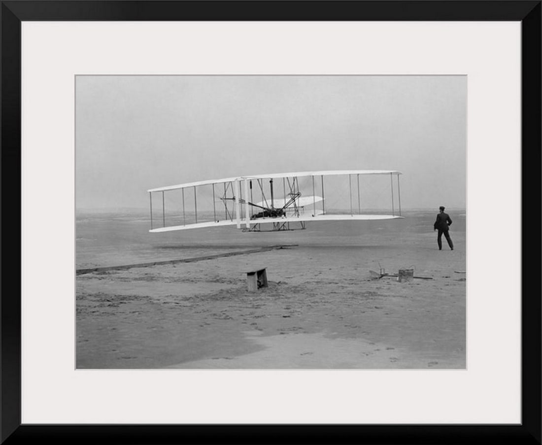 The First Flight of the Wright Flyer 1903 Framed Print Wall Art by Vernon Lewis: The First Flight of the Wright Flyer 1903 Framed Print Wall Art by Vernon Lewis The first flight of the Wright Flyer in 1903. Dimensions: Height 12" x Width 16" View photos for