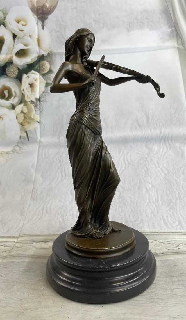 Female Violinist Bronze Statue (Brown Patina Colouring): Female Violinist Bronze Statue (Brown Patina Colouring). Peacefully entranced by her musical gift, this woman plays her violin. Her eyes are closed as she moves the bow back and forth creating beauti