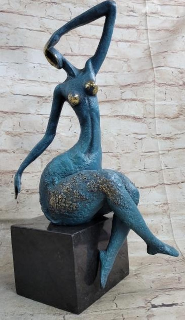 Abstract Sensual Nude Woman Bronze Sculpture: Abstract Sensual Nude Woman Bronze Sculpture An abstract female dancer sculpture. You can just tell this is a powerful dancer in the sharpness of her position. This wonderfully curvaceous woman bears