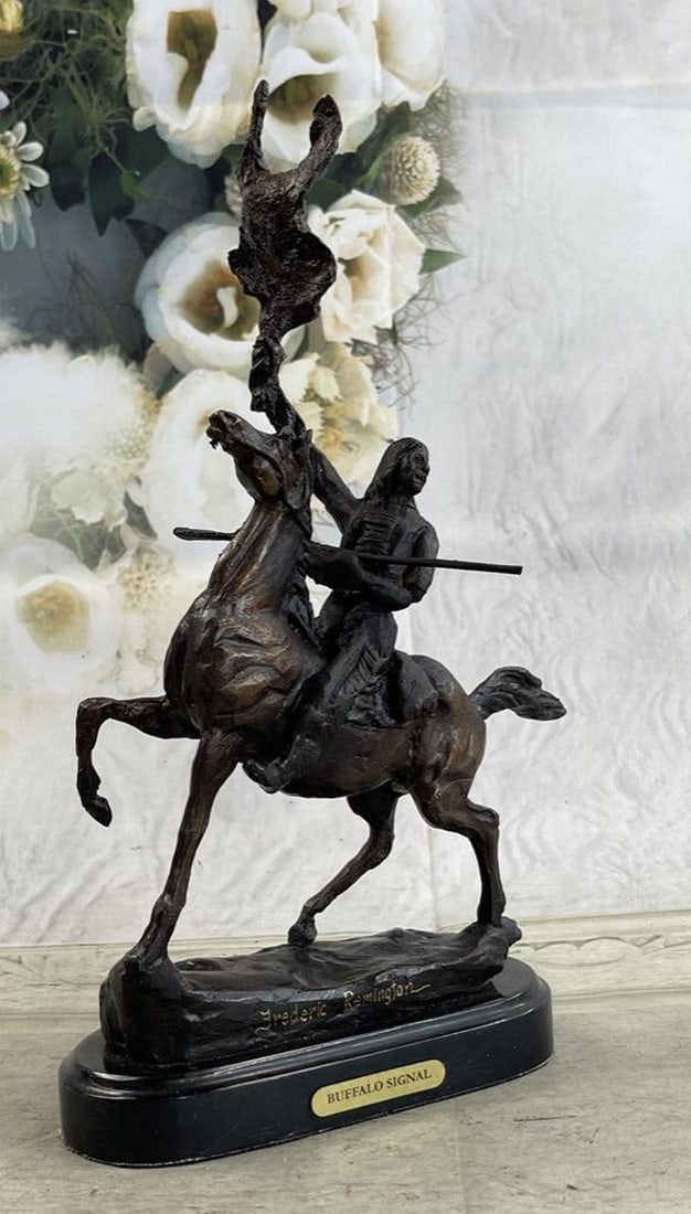 Buffalo Signal Bronze Sculpture: Buffalo Signal Bronze Sculpture One of Frederic Remington's rare bronze sculptures, "The Buffalo Signal" captures a Native American warrior sits triumphantly atop his horse. He holds
